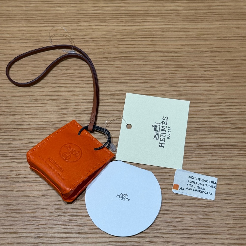 Hermès Orange Milo shopping bag charm